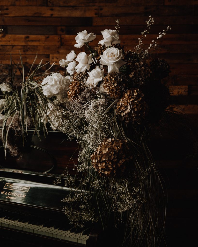 A wedding table scape of earthy tones and muted hues for an industrial micro wedding