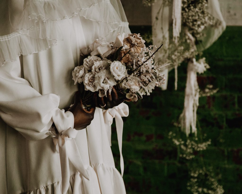 Close up of natural toned dried wedding bouquet for cool city industrial micro wedding