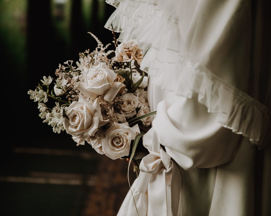 Close up of wedding flowers for industrial warehouse micro wedding style for cool wedding couple