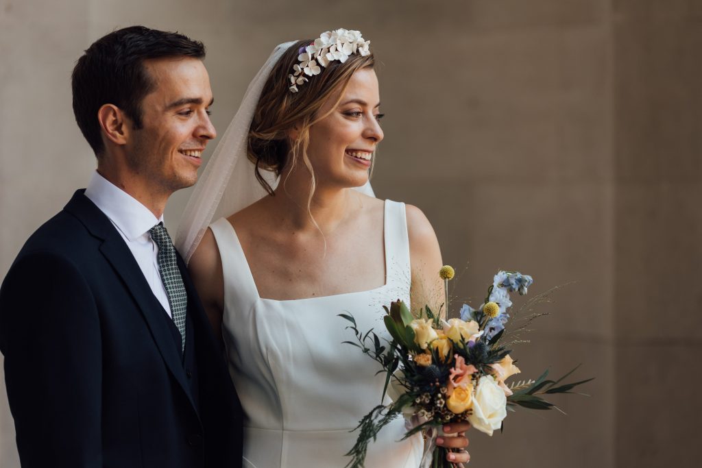 Newly married couple soaking in that just married feeling at their London ceremony venue