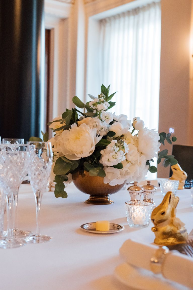Small white table centre piece decor for city mmicro wedding couple at The Ned London