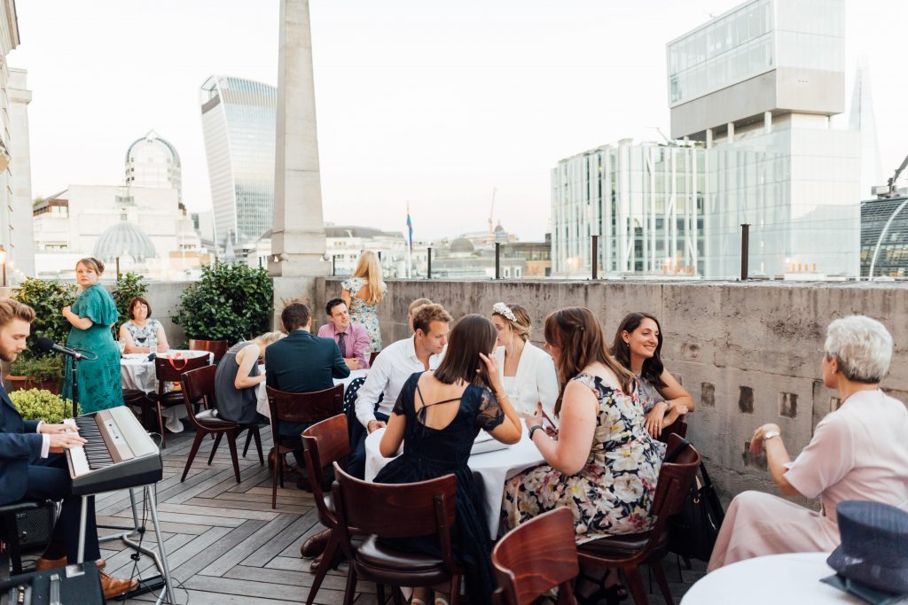 City rooftop wedding reception for low key micro wedding couple