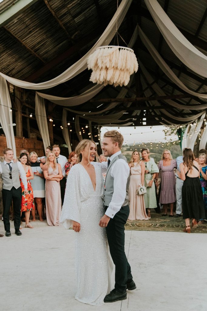 First dance for summer wedding couple with ASOS sparkly wedding outfit