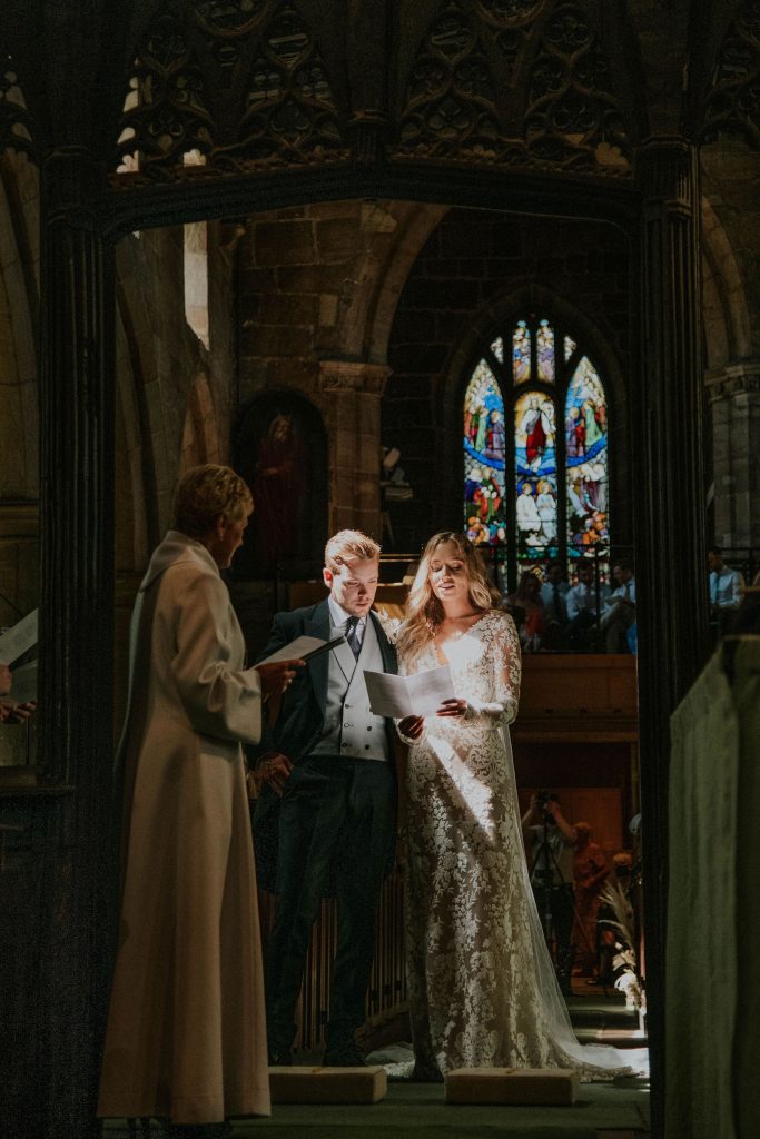 Bride and groom enjoying their emotional church wedding service