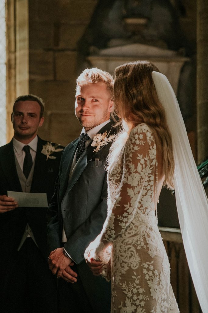 Bride and groom enjoying their emotional church wedding service