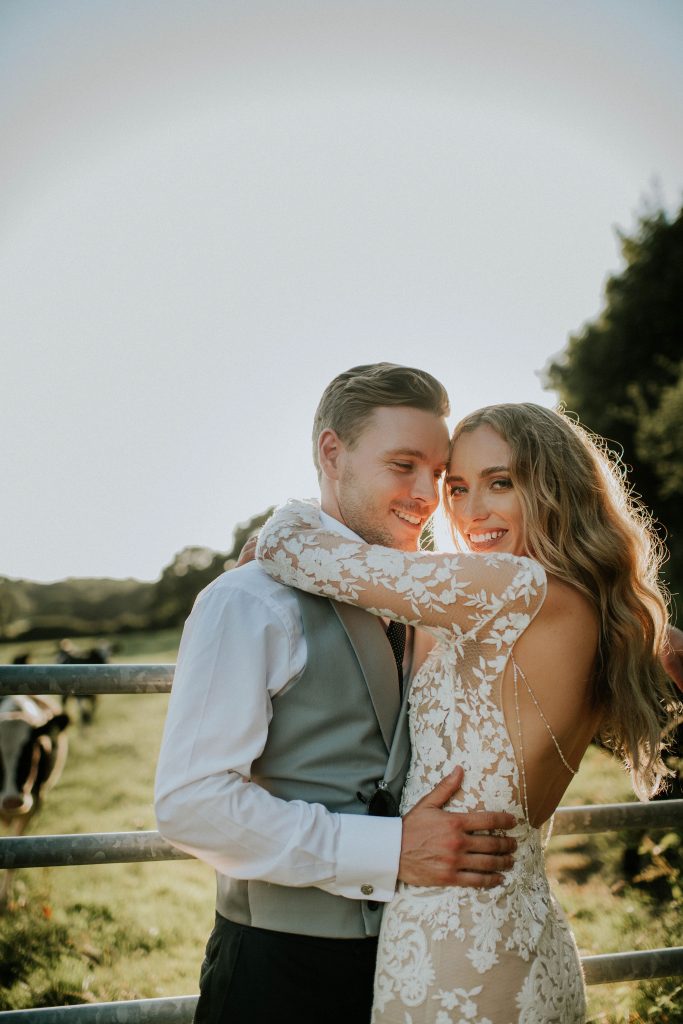 Golden hour newly married couple portrait for summer festival wedding couple