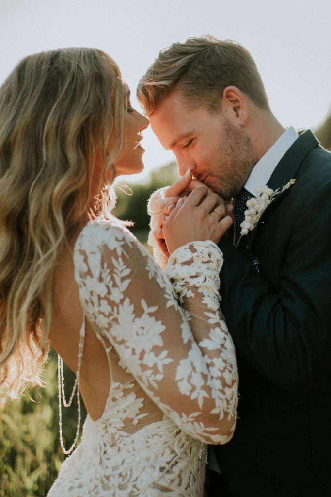 Golden hour newly married couple portrait for summer festival wedding couple