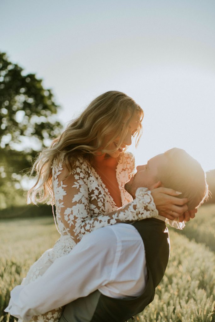 Golden hour newly married couple portrait for summer festival wedding couple