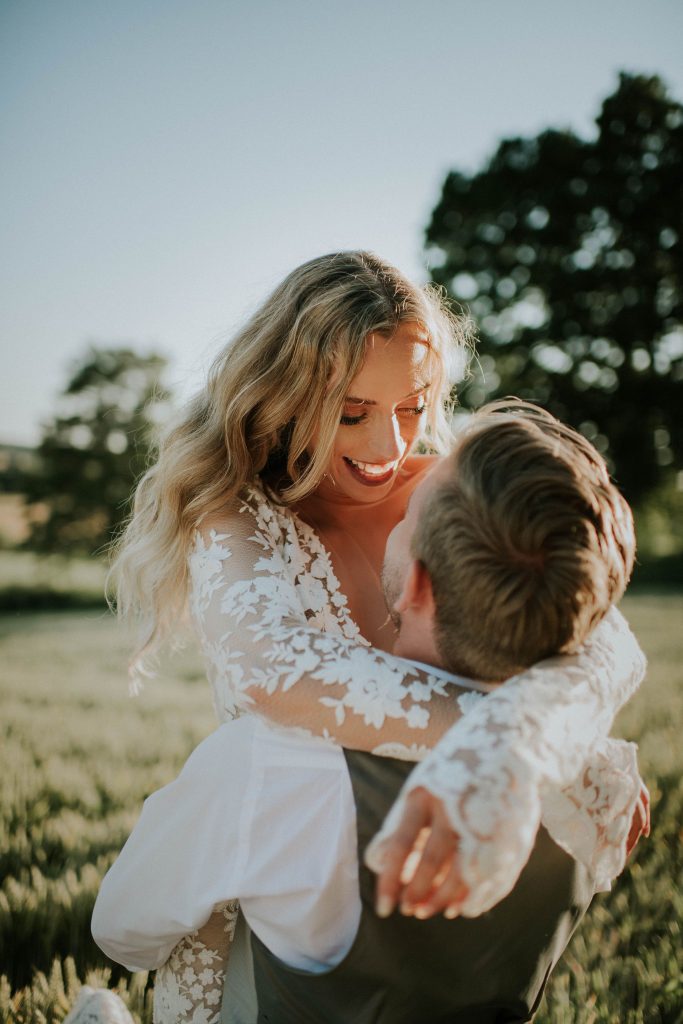Golden hour newly married couple portrait for summer festival wedding couple