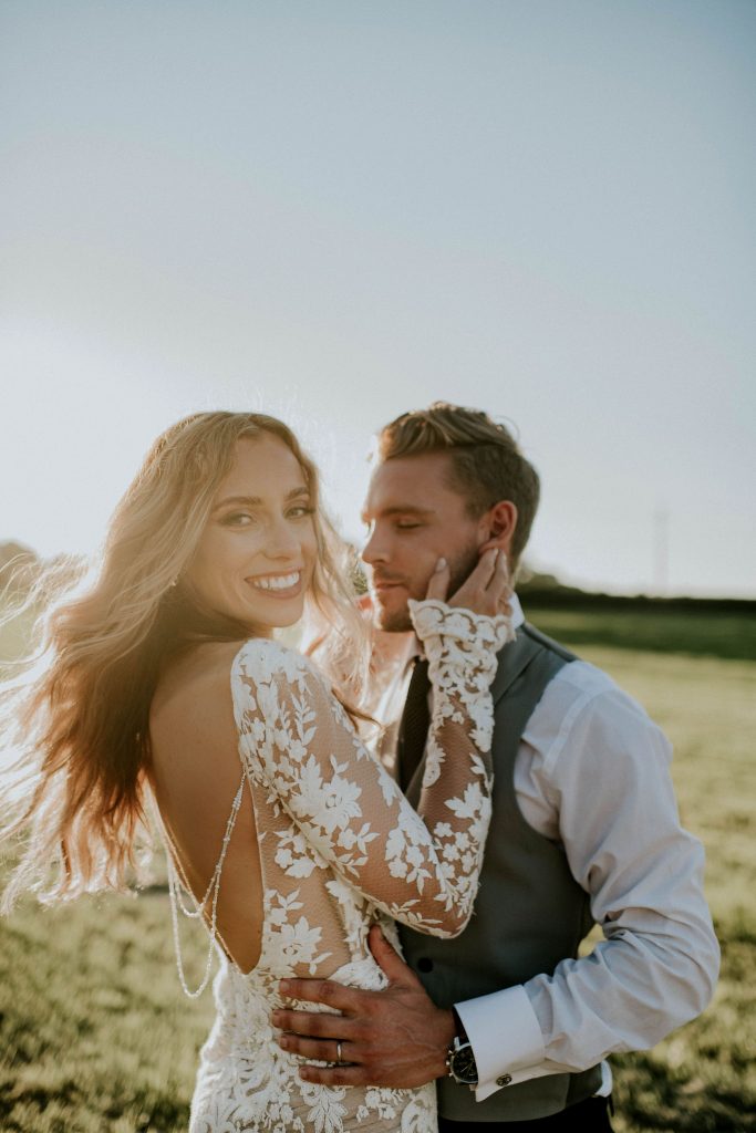 Golden hour newly married couple portrait for summer festival wedding couple