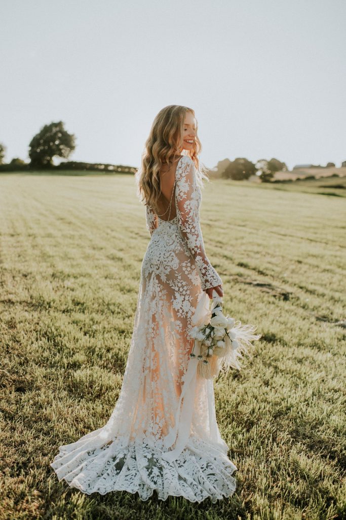 Beautiful modern boho bride in summer festival wedding