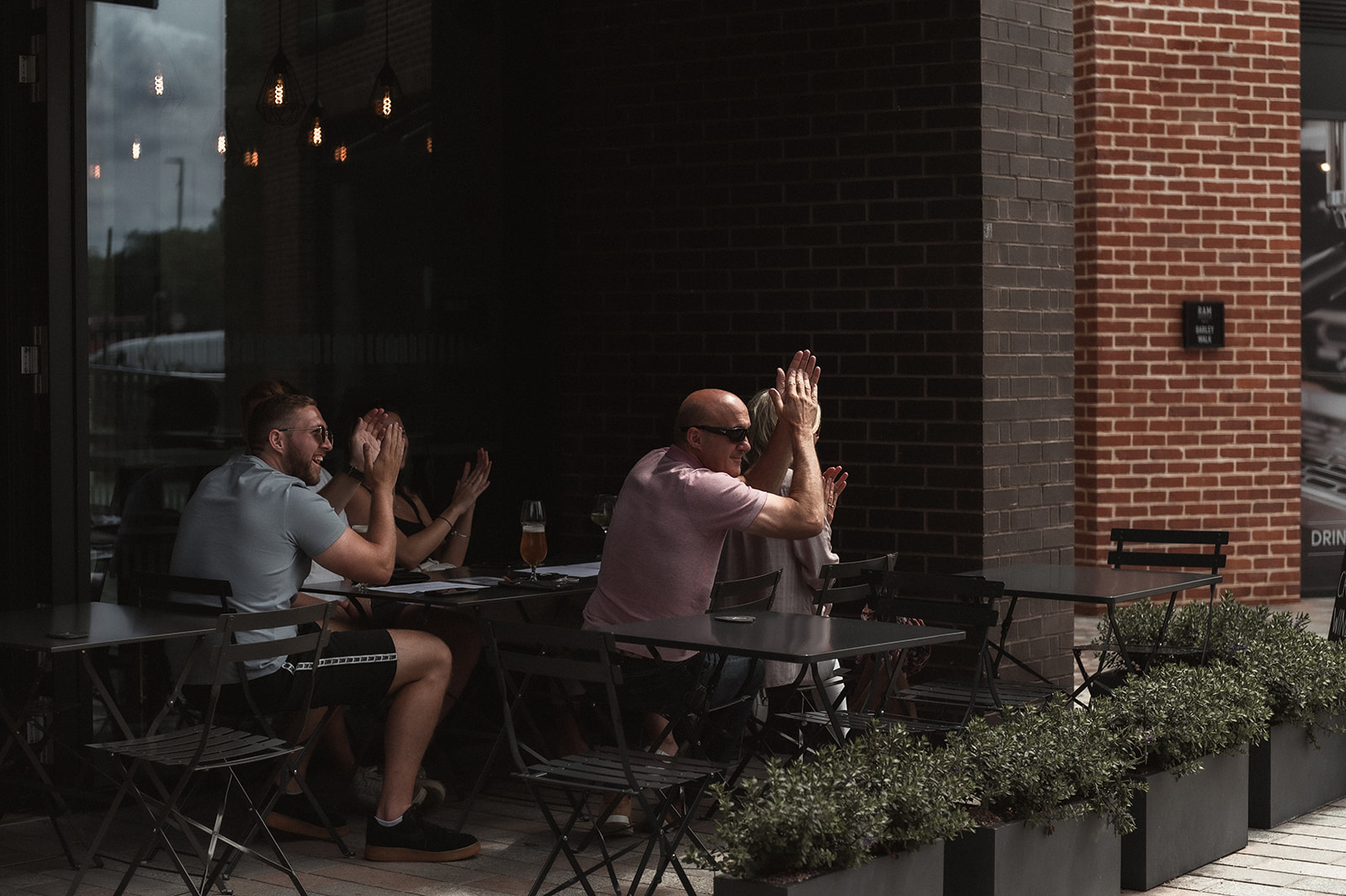 Cheering public welcoming newlyweds