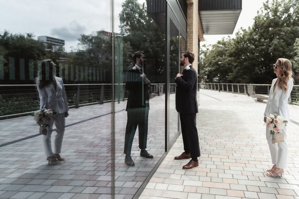 Wedding couple in wedding suits