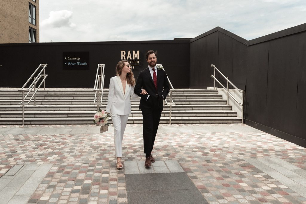 An intimate city micro wedding with white bridal suit