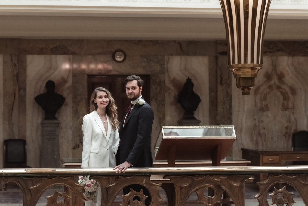 Newly married bride and groom at registry office in London
