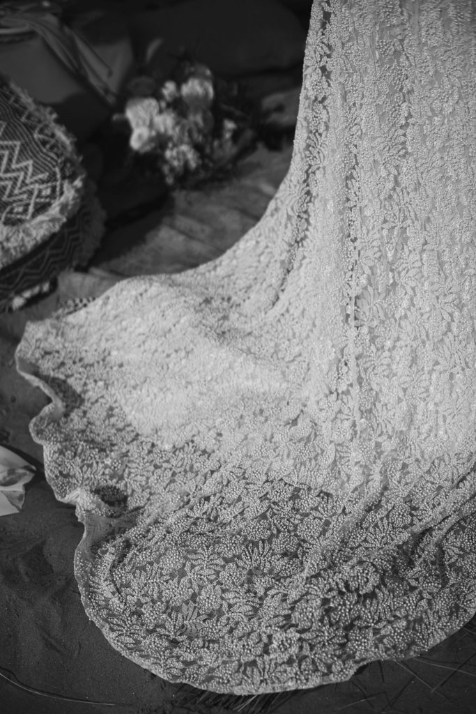 Intricate detailed romantic wedding dress for beach elopement