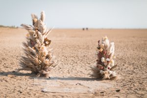 Pampas pillar beach wedding ceremony styling