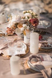 Wedding beach themed tablescape in a sunset colour palette