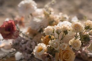 Wedding beach themed tablescape in a sunset colour palette