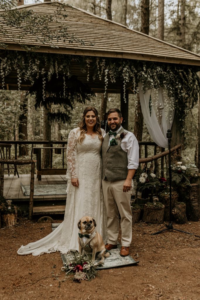 Newly wed portrait of modern boho woodland ceremony couple and their dog Wallace