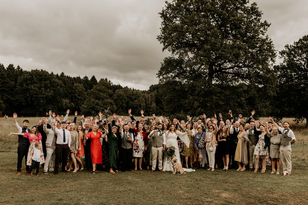 Group shot for Aimee and Rob's outdoor wedding