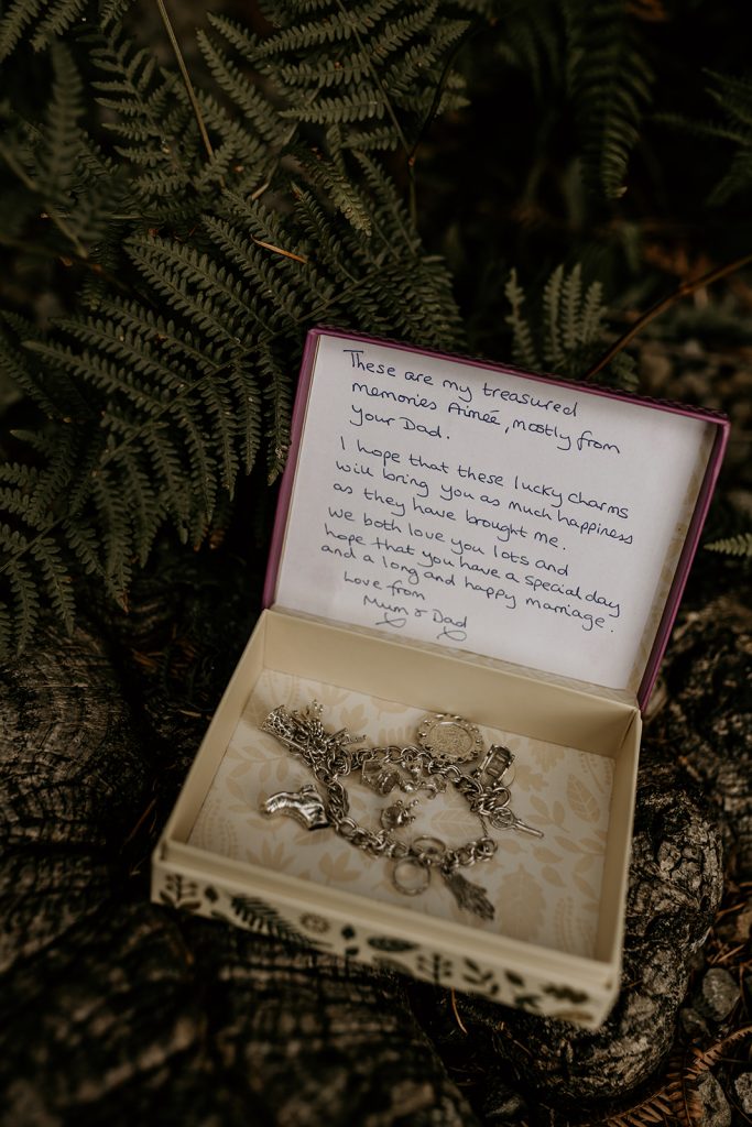 A beautiful charm bracelet present from a bride's parents to their daughter on her wedding day