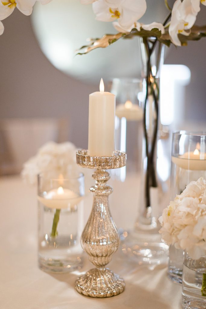 Dusk wedding reception shoot featuring all white styling and couture gowns