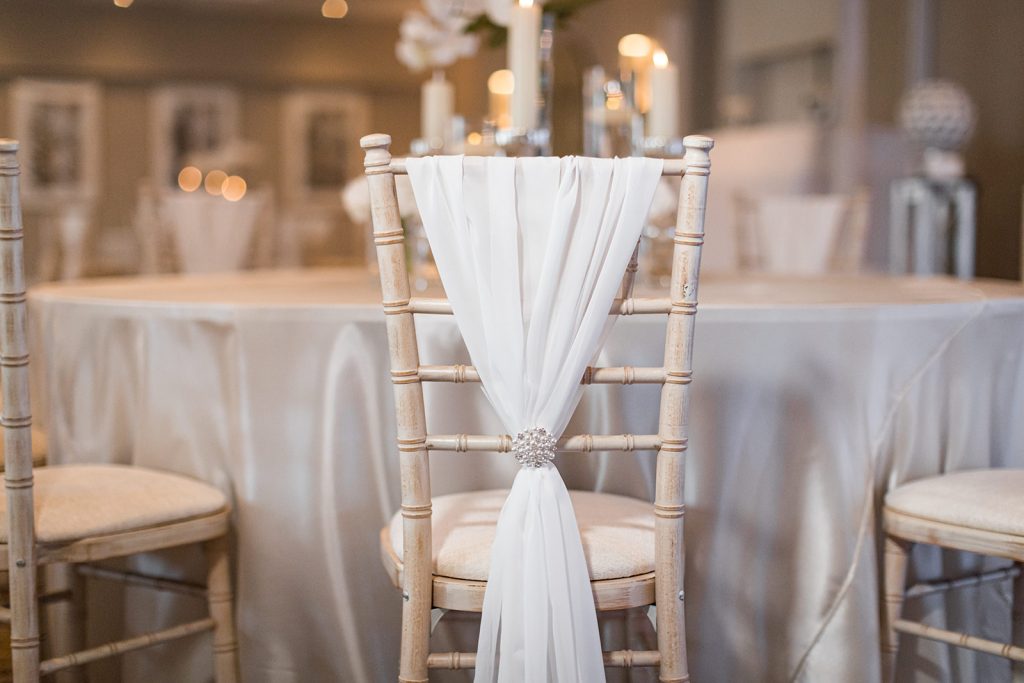 Dusk wedding reception shoot featuring all white styling and couture gowns