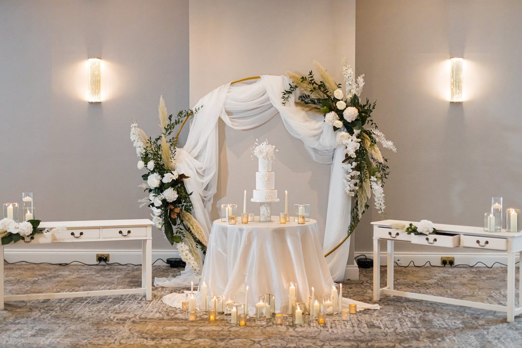Dusk wedding reception shoot featuring all white styling and couture gowns