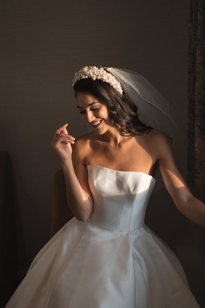 Mirror Mirror London couture strapless wedding gown with highly embellished headpiece and short veil