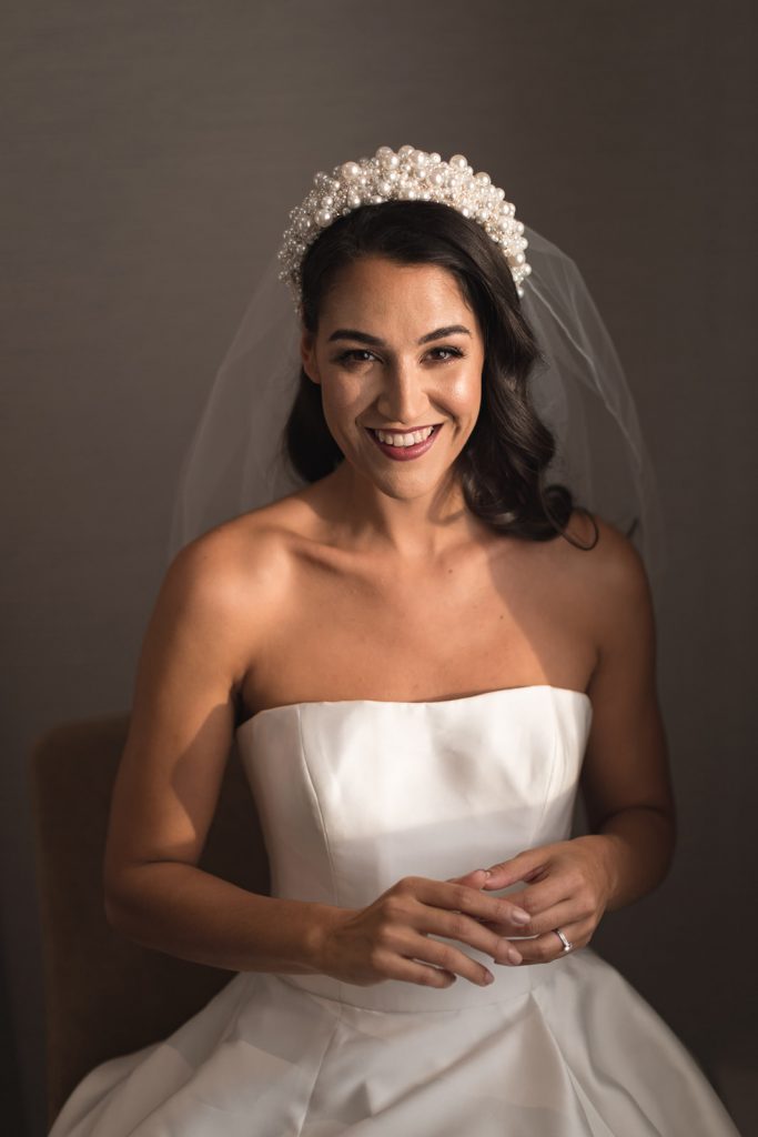 Mirror Mirror London couture strapless wedding gown with highly embellished headpiece and short veil
