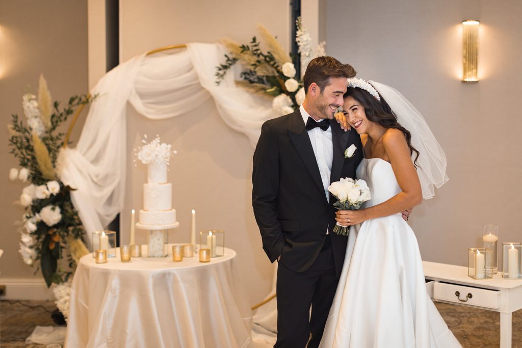 Dusk wedding reception shoot featuring all white styling and couture gowns