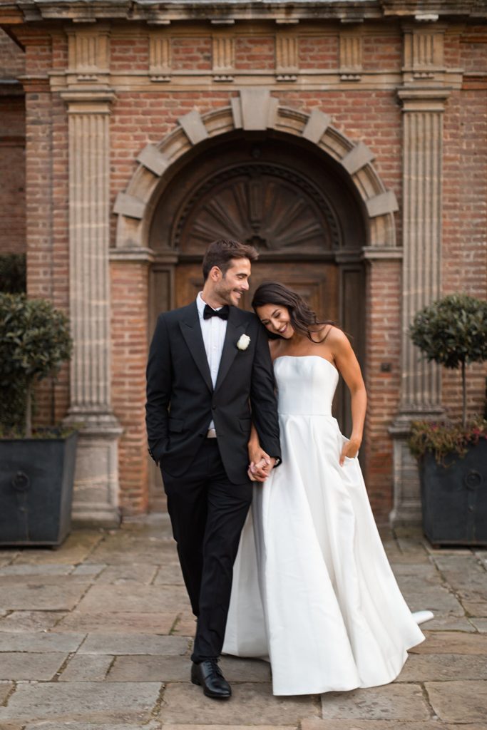 Dusk wedding reception shoot featuring all white styling and couture gowns