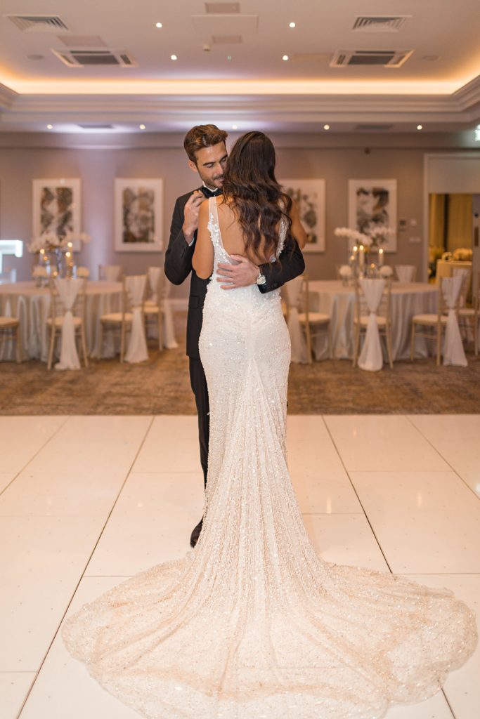 Dusk wedding reception shoot featuring all white styling and couture gowns
