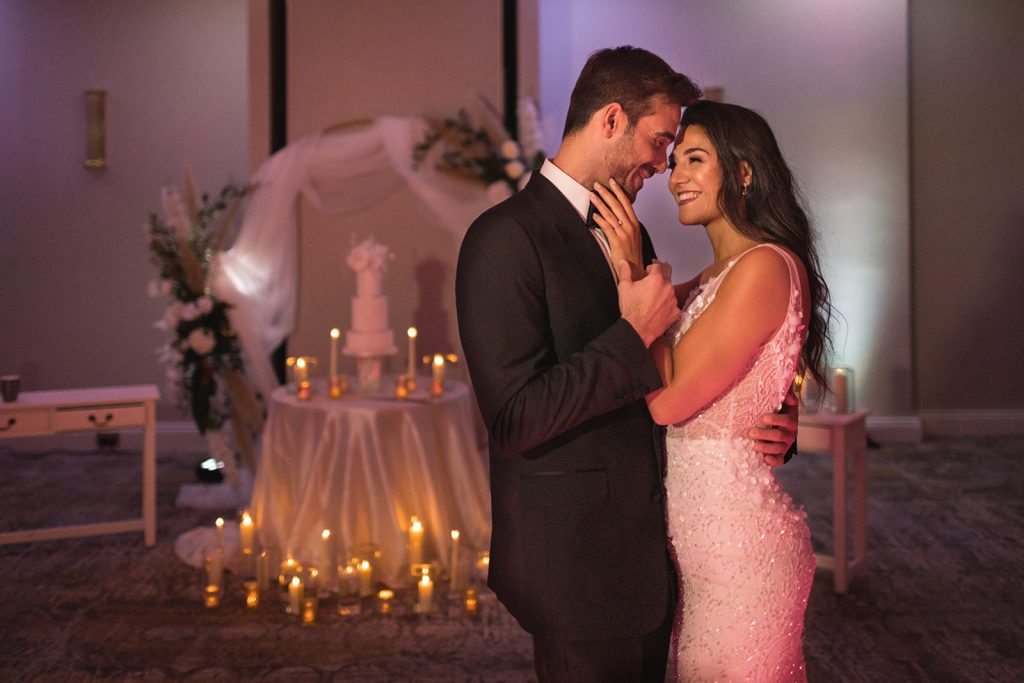 Dusk wedding reception shoot featuring all white styling and couture gowns