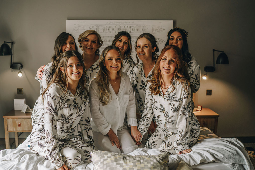 Bridesmaids wearing matching pyjama's during bridal prep