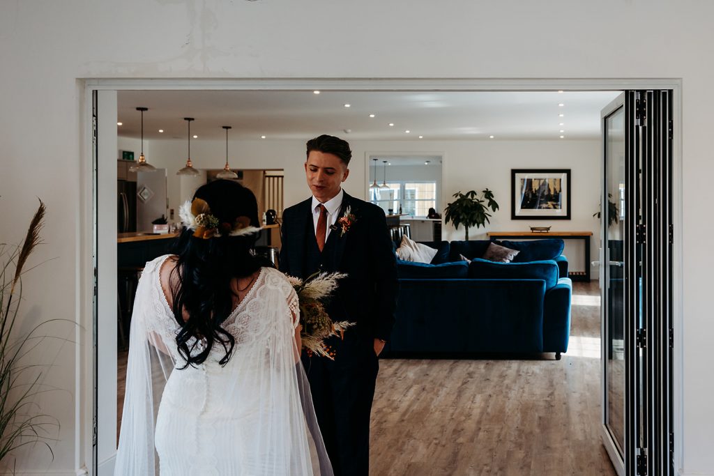 An emotional 'First Look' for bride and groom before their wedding ceremony