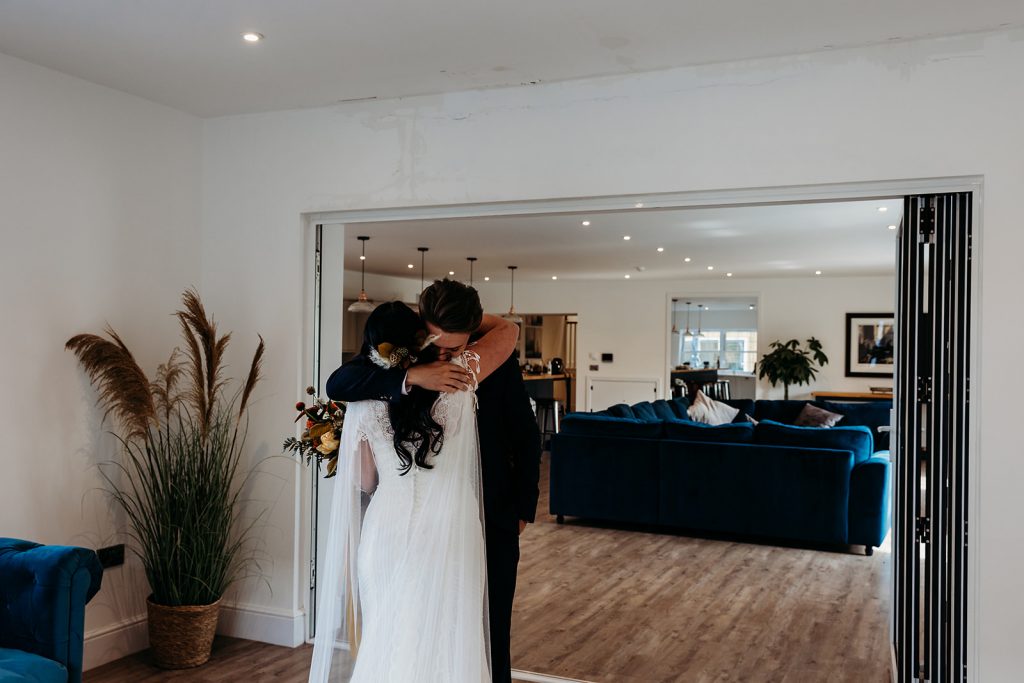 An emotional 'First Look' for bride and groom before their wedding ceremony