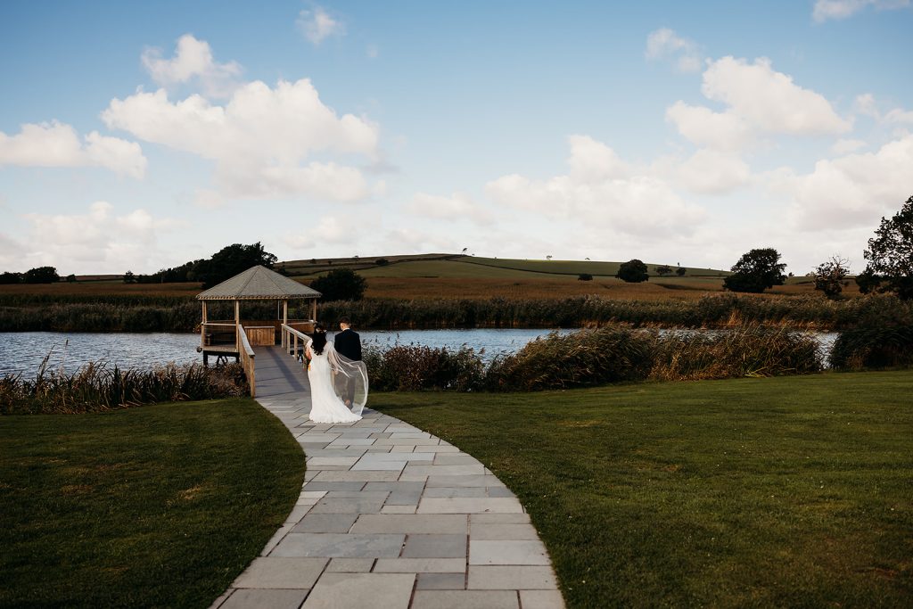 Bride and Groom head to the lakes at their Somerset wedding venue for some portrait shots to be taken