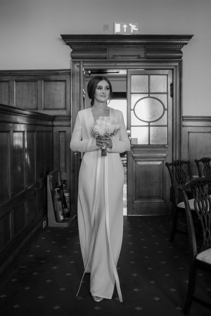 Bride Katja makes her way down the aisle where her soon to be husband awaits