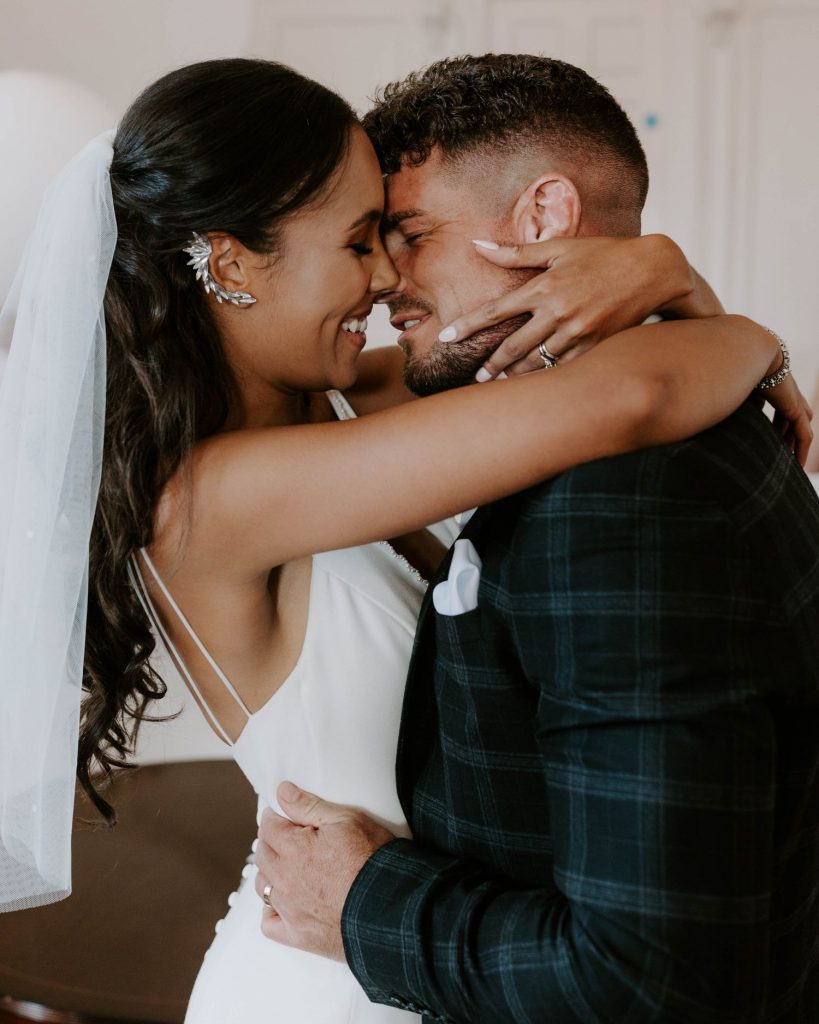 The first kiss for newlyweds Madison + Justin