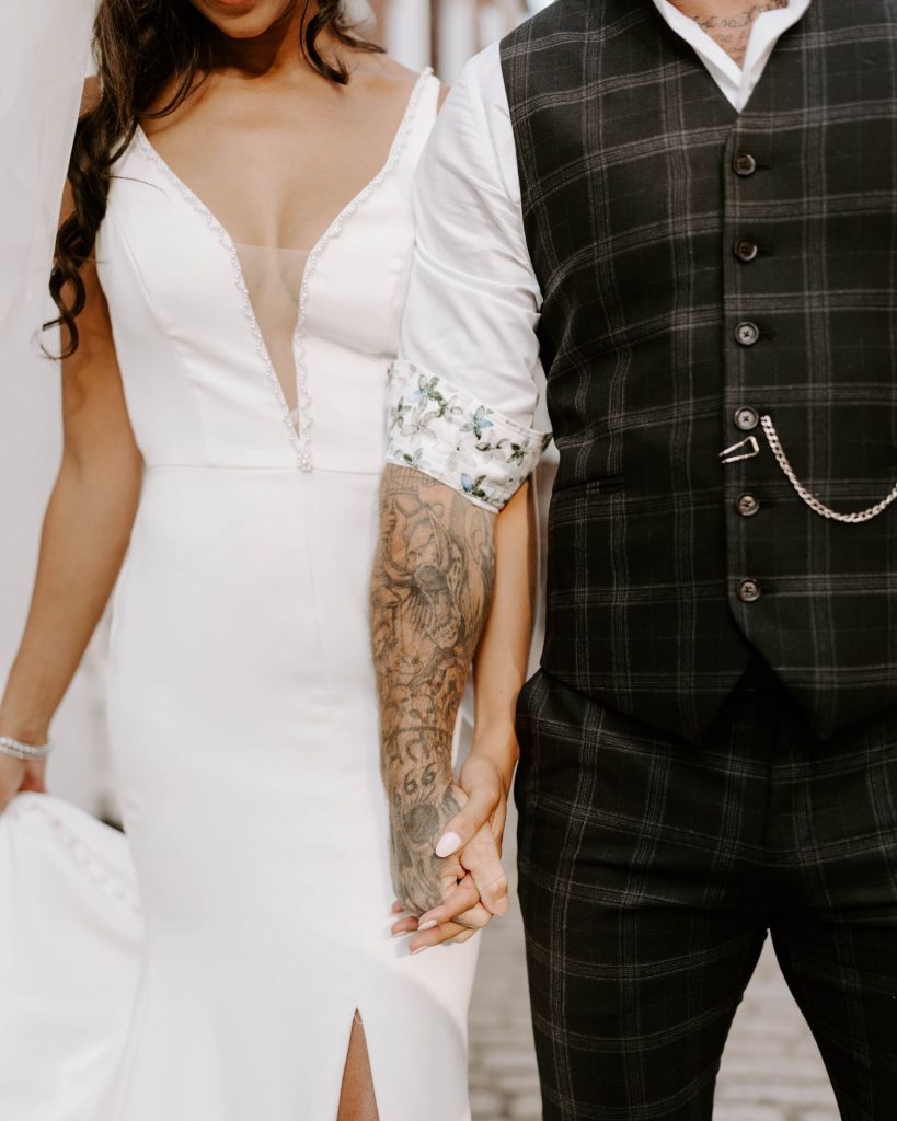 A newlywed bride and groom enjoy some quiet alone time to soak in their newlywed status