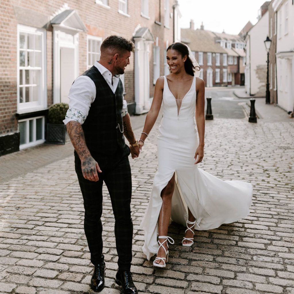 A newlywed bride and groom enjoy some quiet alone time to soak in their newlywed status