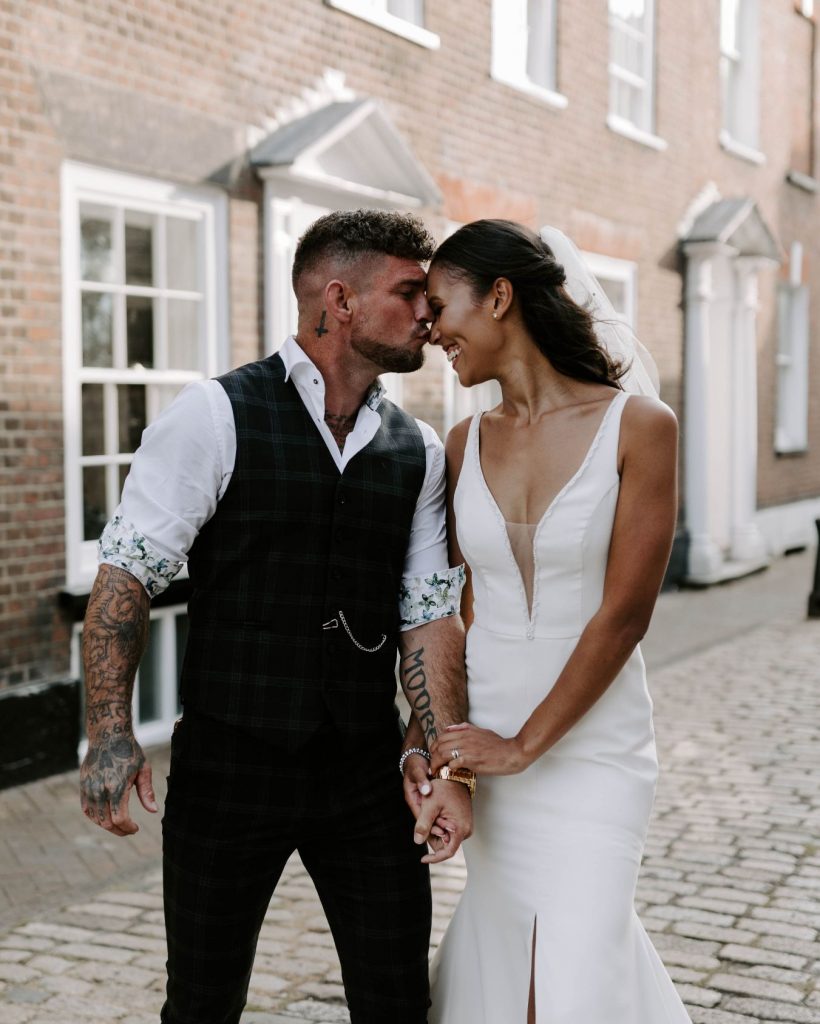 A newlywed bride and groom enjoy some quiet alone time to soak in their newlywed status