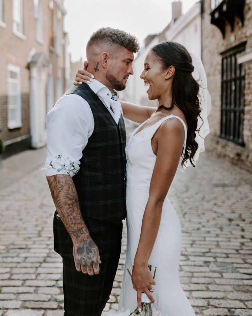 A newlywed bride and groom enjoy some quiet alone time to soak in their newlywed status