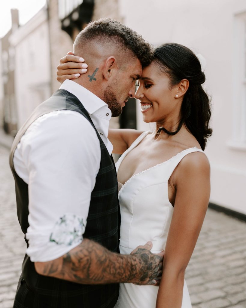 A newlywed bride and groom enjoy some quiet alone time to soak in their newlywed status