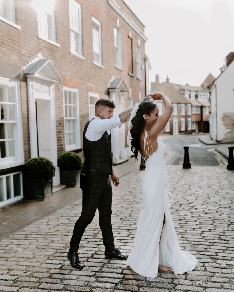 A newlywed bride and groom enjoy some quiet alone time to soak in their newlywed status