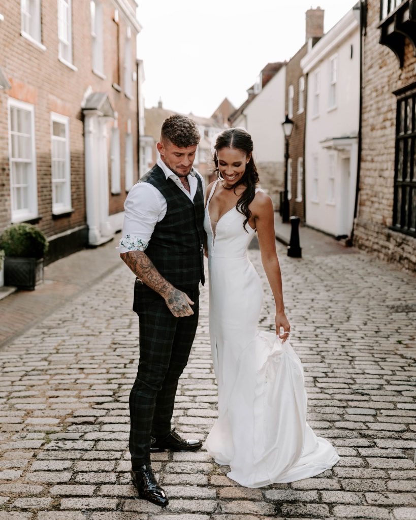 A newlywed bride and groom enjoy some quiet alone time to soak in their newlywed status