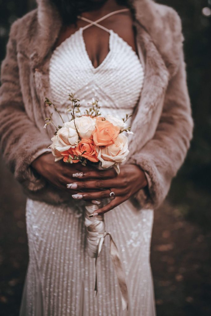 Delicate small wedding bouquet of flowers for bride Olivia