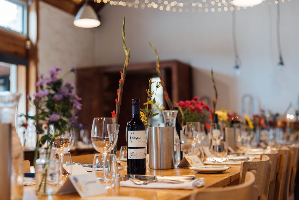 British blooms and colourful wild flowers styled beautifully for Louise and Simon's non-traditional wedding